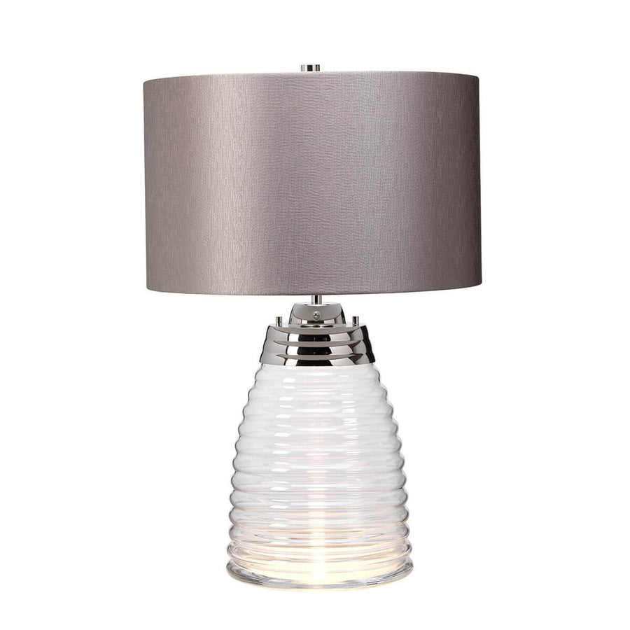 Lampe à poser de face, abat-jour taupe et socle en verre cerclé