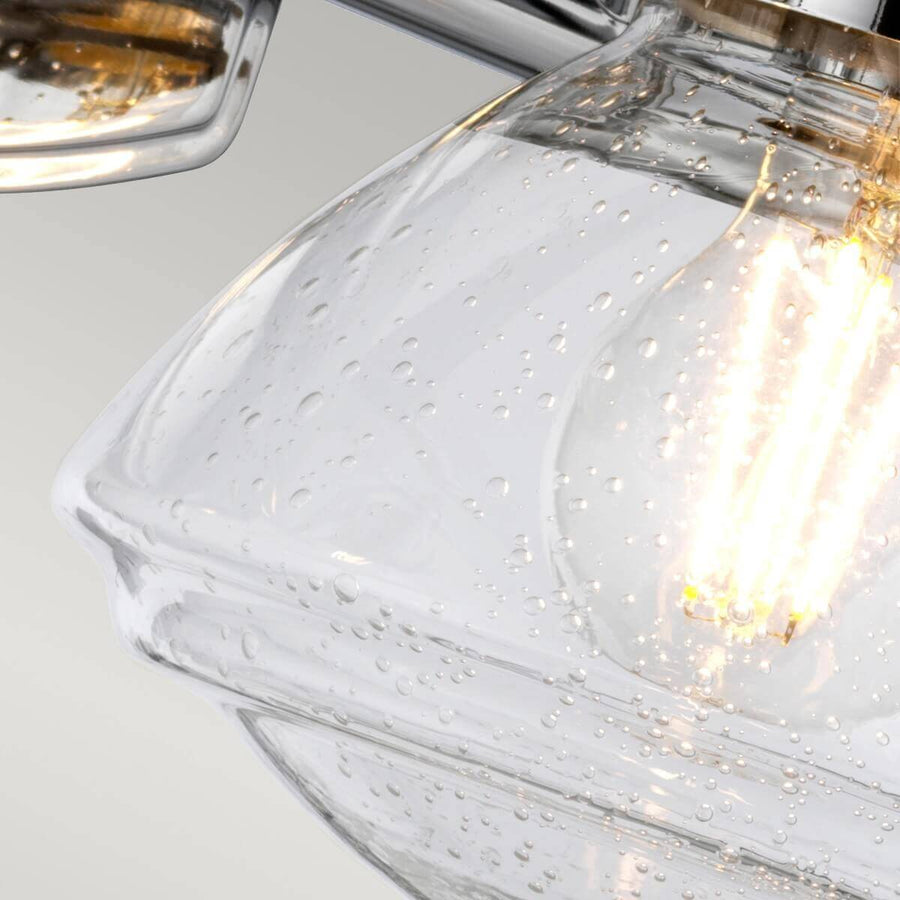 Gros plan sur le verre bullé laissant apparaître l'ampoule à filament