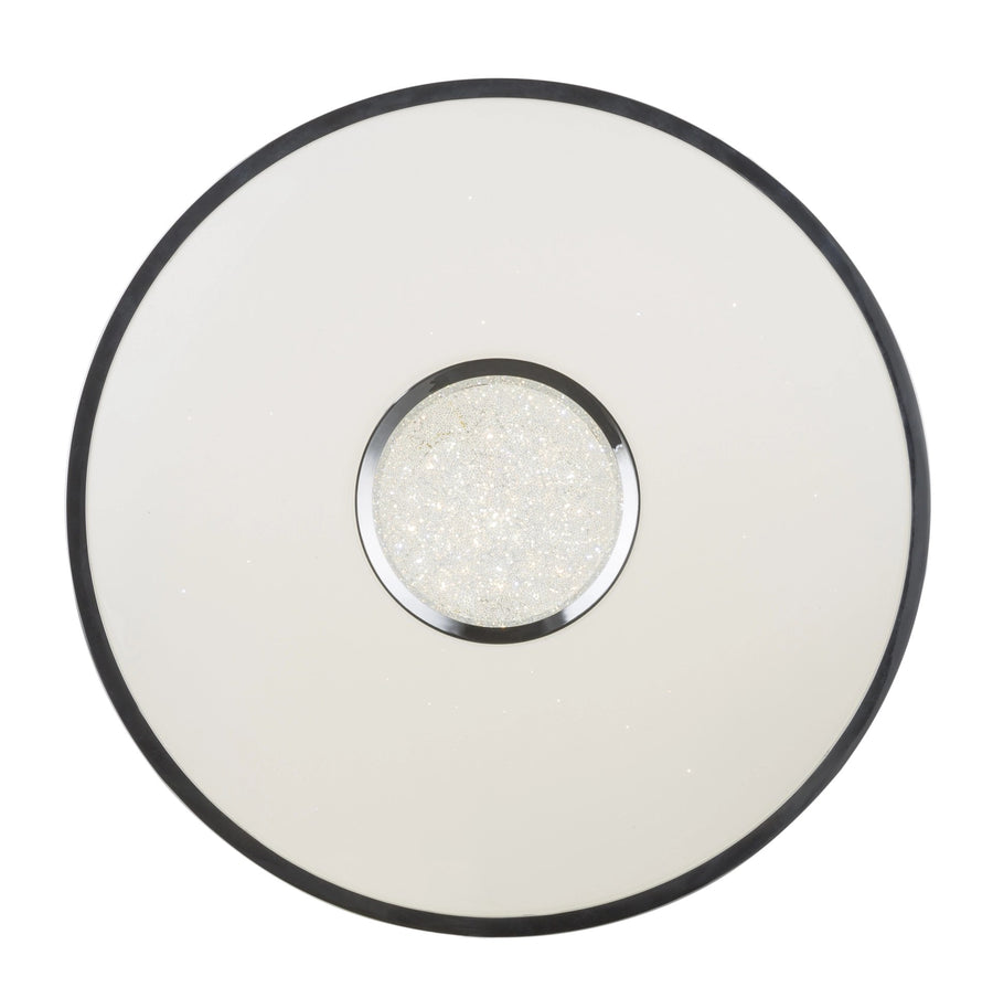 Vue de dessous du luminaire rond, large diffuseur ivoire et pastille centrale en cristal scintillant