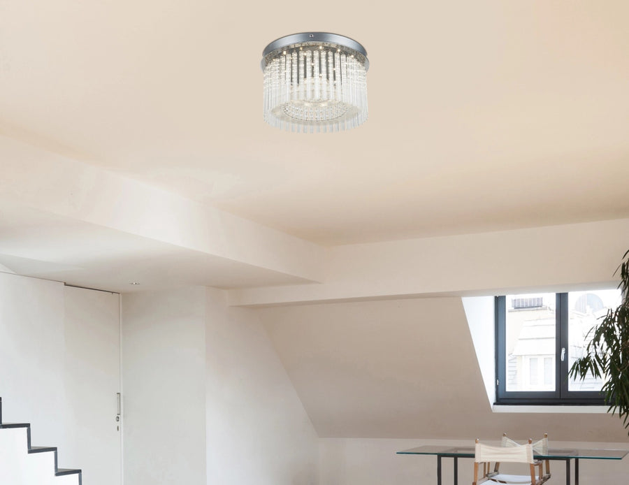 Vue en situation du plafonnier sur plafond blanc, près d'une fenêtre de toit.