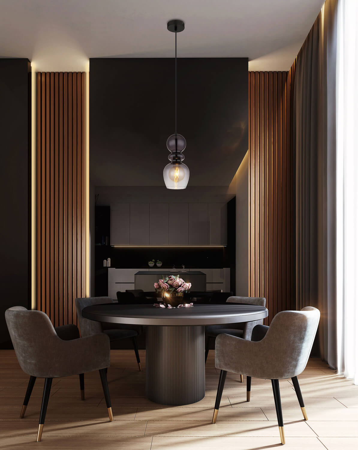 Mise en ambiance large de la suspension éclairée au-dessus du coin repas