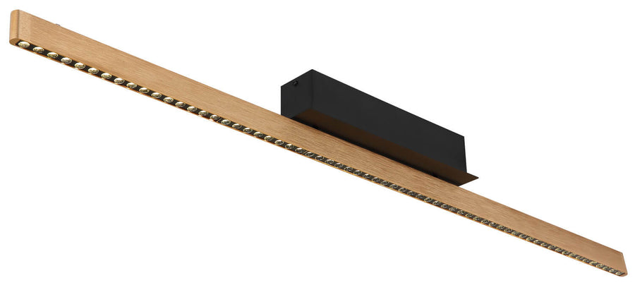 Vue de dessous dévoilant la rangée de LED serties dans la barre dorée