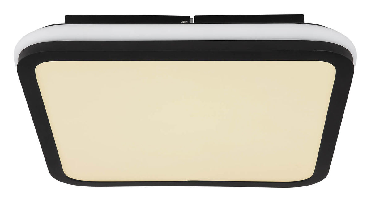 Vue frontale du luminaire allumé, diffuseur crème en lumière chaude
