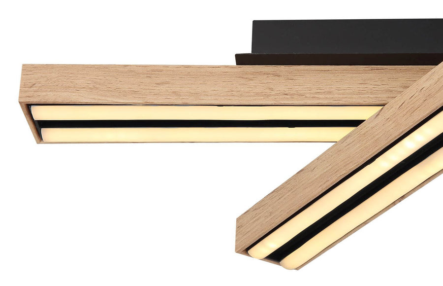 Détail rapproché de la finition bois et du diffuseur LED allumé