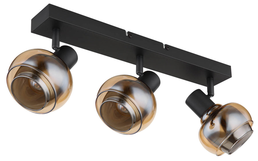 Vue en contre-plongée du luminaire, détails des cerclages métalliques et verre fumé.