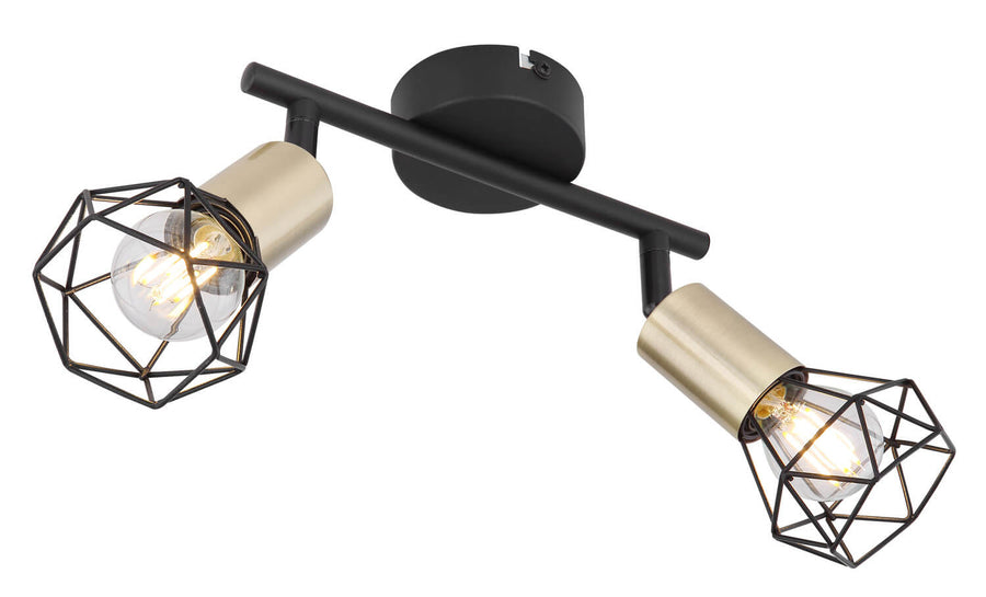 Gros plan du spot double avec ampoules allumées et cages métalliques noires.