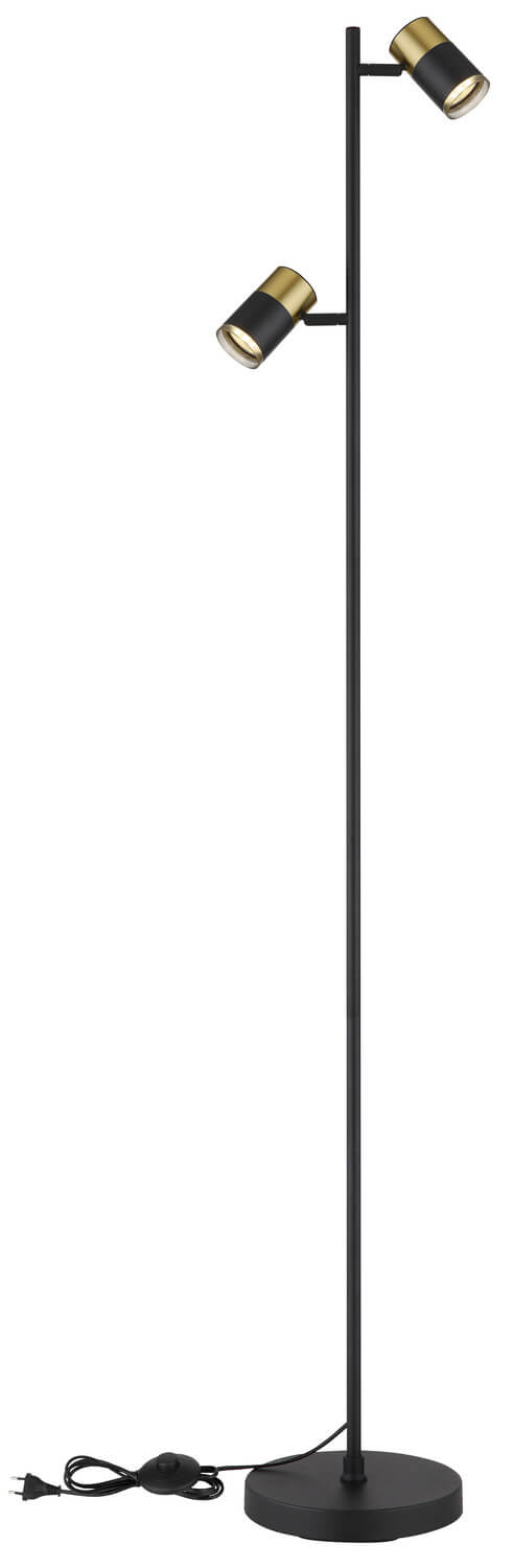 Lampadaire noir mat avec câble d'alimentation et prise visibles au sol.