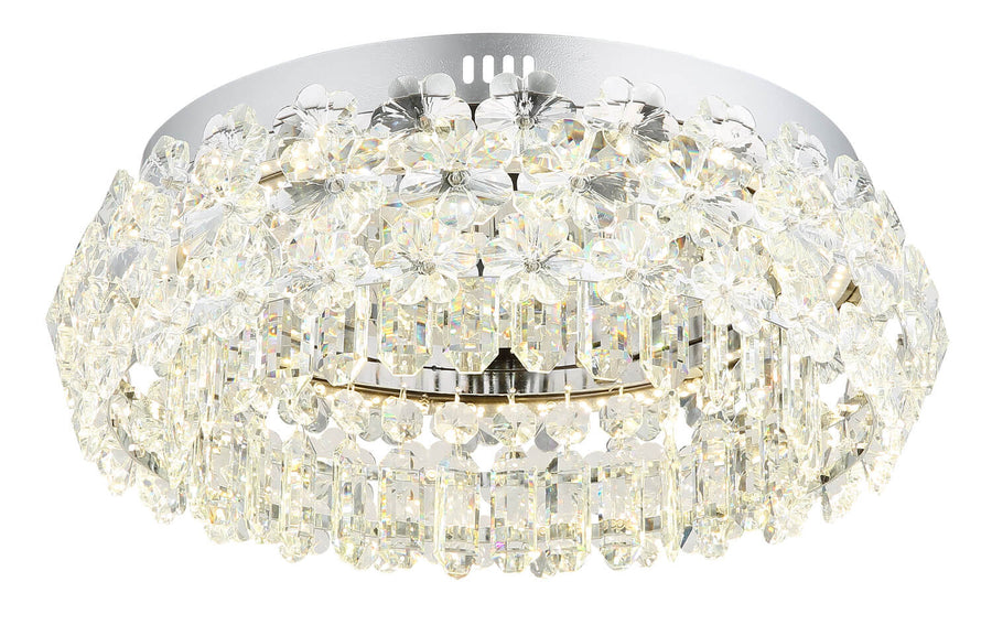 Détail rapproché des fleurs et prismes de cristal allumés, reflets irisés sur l'armature chromée.