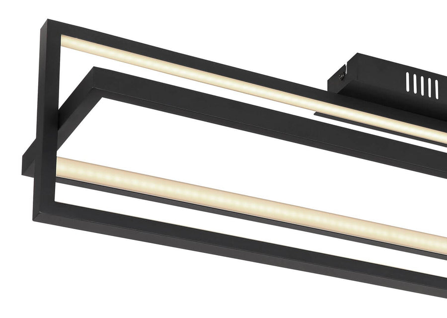 Détail du cadre noir et du bandeau LED montrant la finition et l'assemblage.