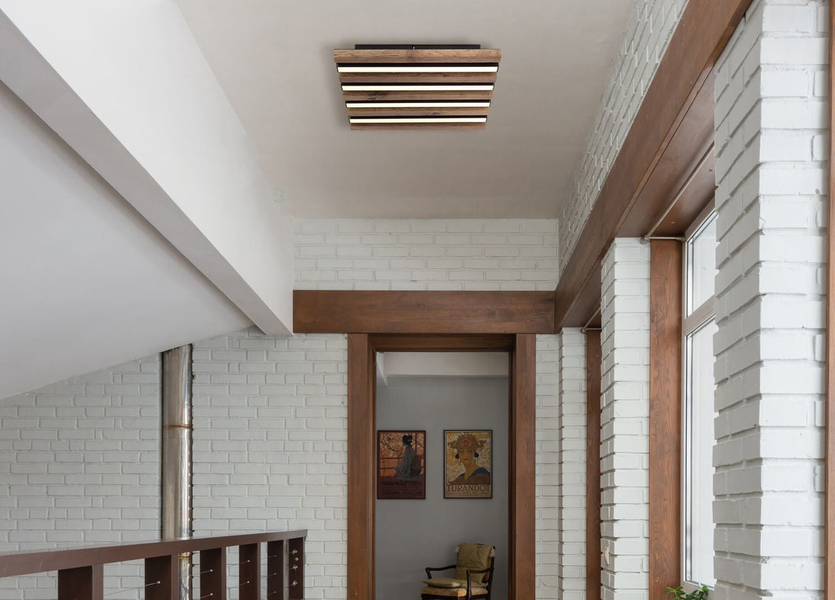 Plafonnier fixé au plafond dans un intérieur à briques blanches, mise en ambiance