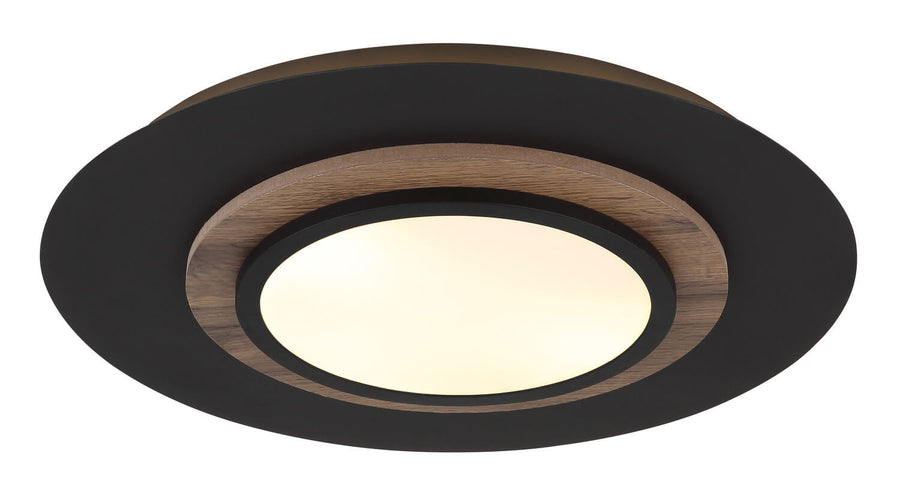 Vue rapprochée du plafonnier allumé, cerclage bois et verre opalin éclairé