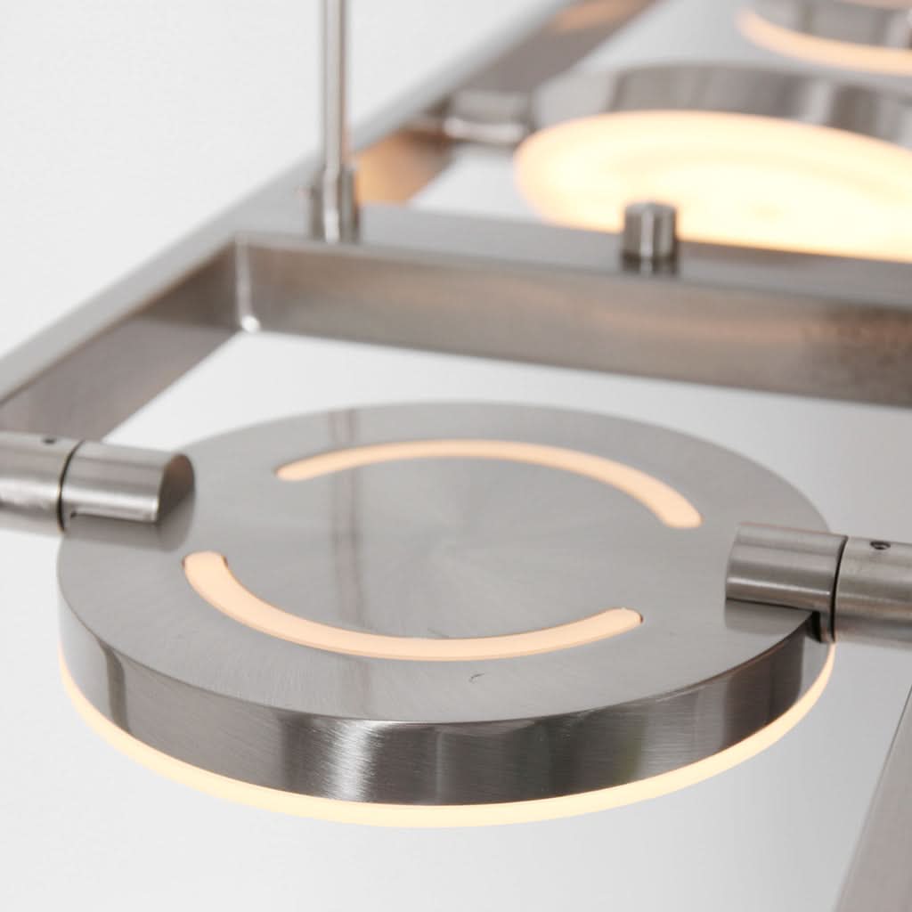 Détail disque LED croissant lumière blanc chaud acier brossé