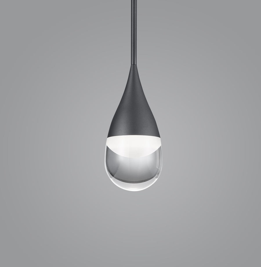 Détail rapproché du diffuseur en verre et de la finition noire mate du corps.