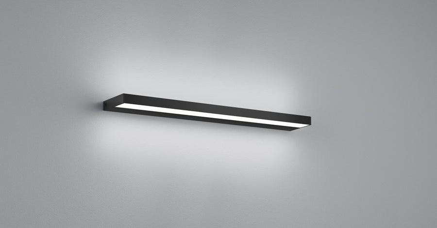 Vue rapprochée du bandeau noir éclairé et de son halo lumineux