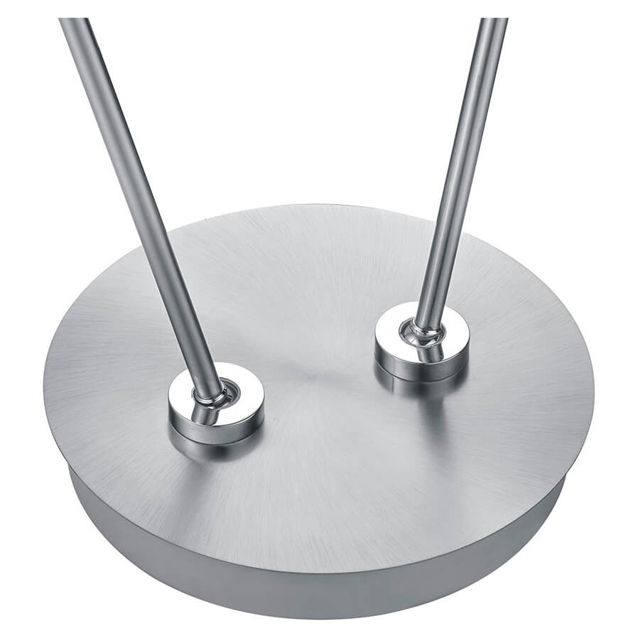 Détail de la base ronde en métal brossé et fixation des deux tiges