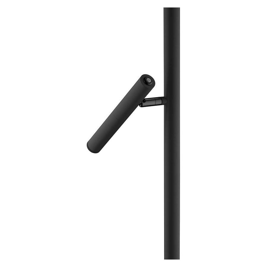 Détail d'un projecteur cylindrique noir orientable fixé sur la tige verticale.