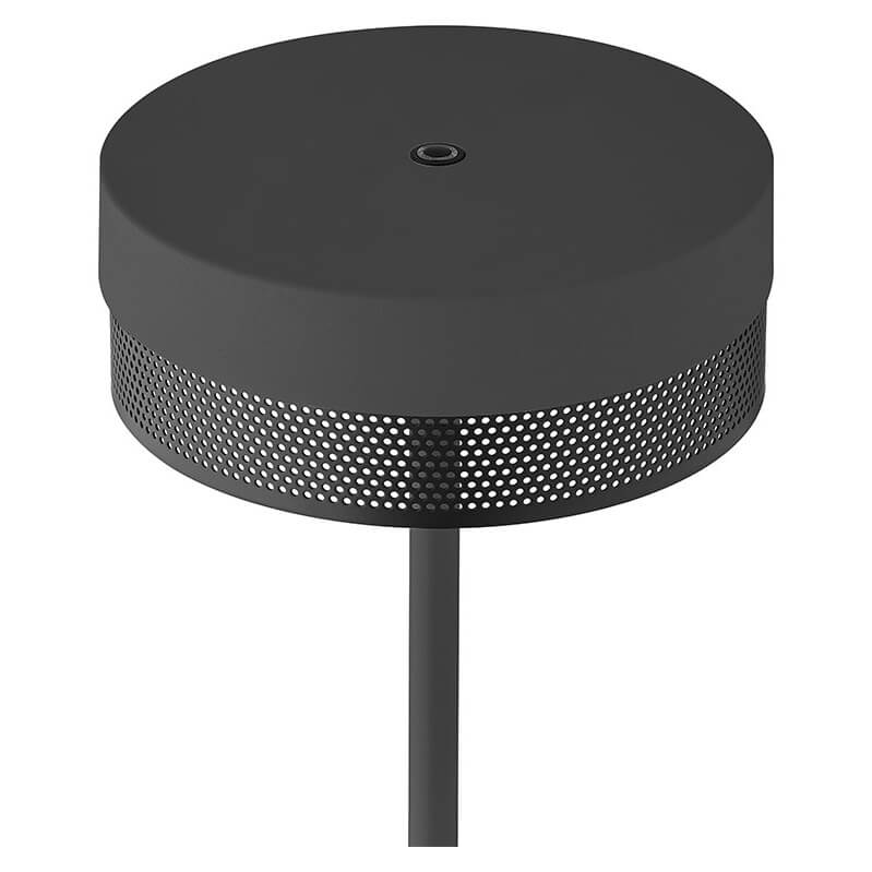 Détail du diffuseur cylindrique noir perforé et de sa tige centrale.