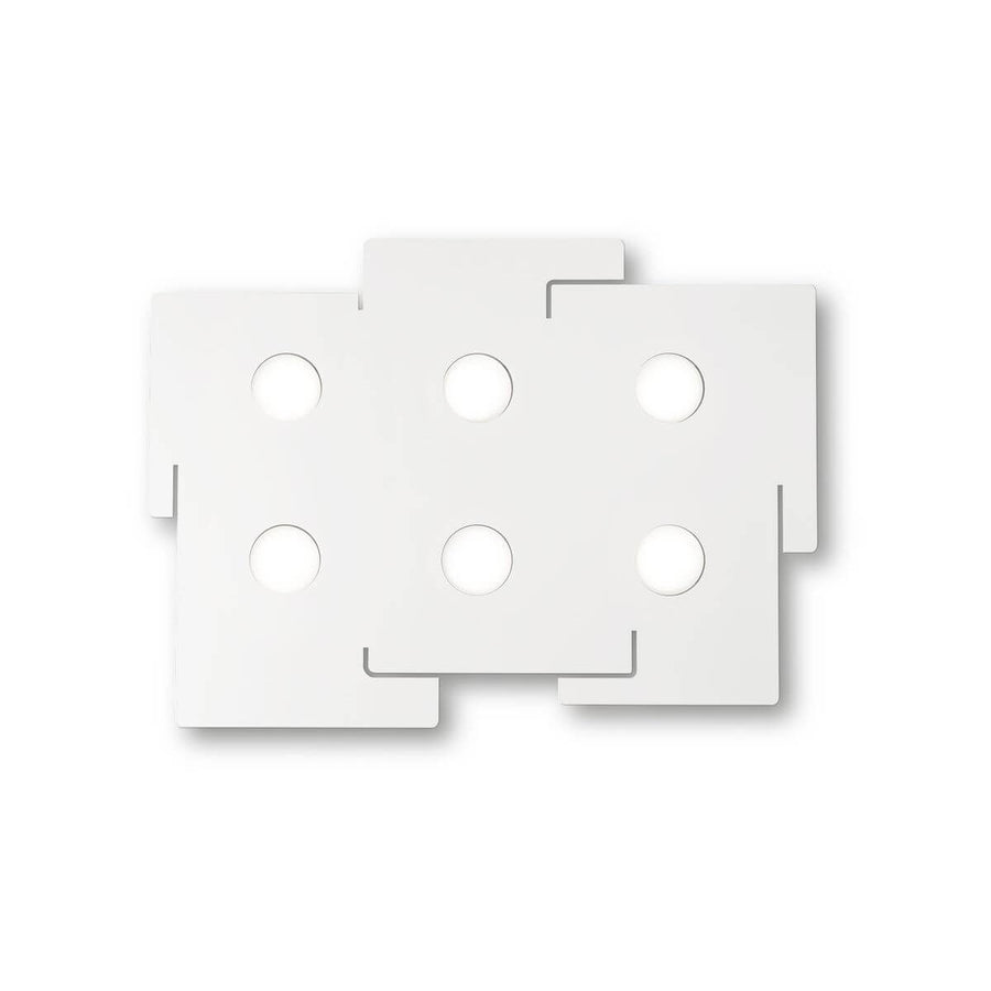 Vue de face du plafonnier blanc composé de panneaux rectangulaires superposés