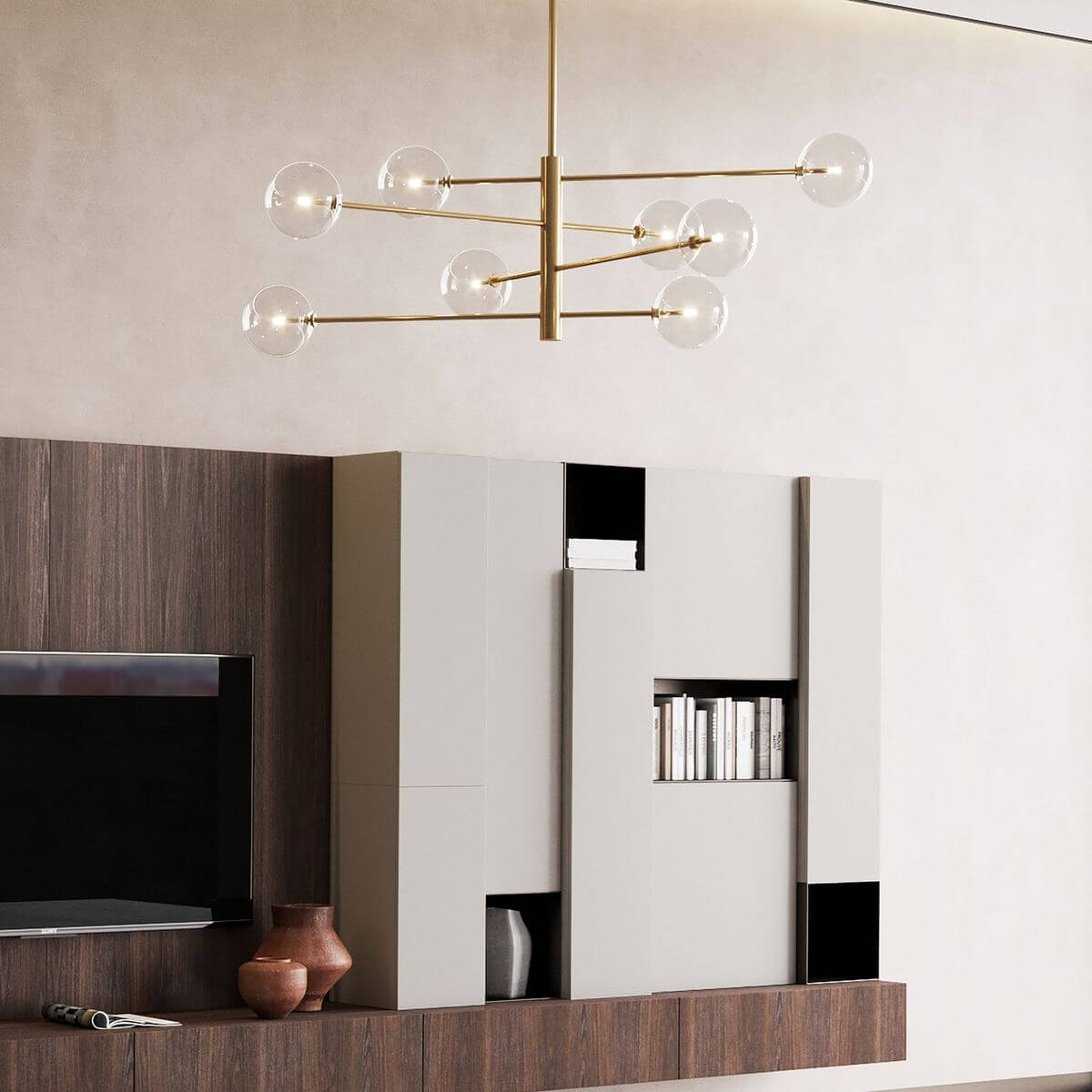Luminaire doré suspendu au-dessus d'un meuble TV en bois, dans un salon contemporain
