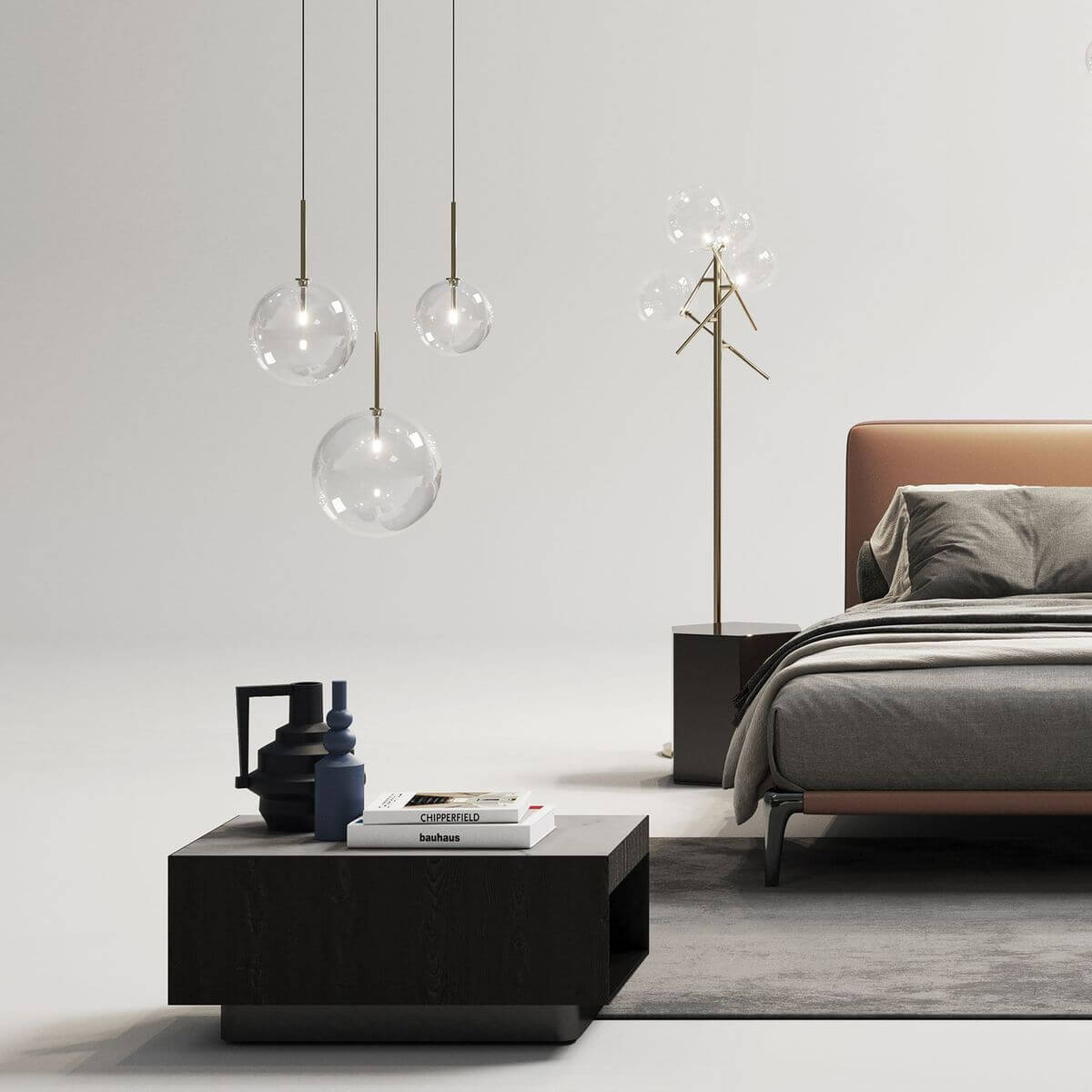 Suspensions en verre transparent éclairées dans une chambre contemporaine, avec lit, table basse et lampadaire