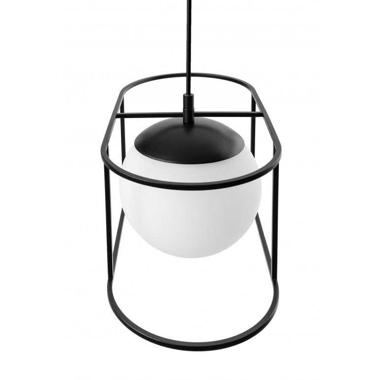 Plongée verticale montrant le dôme noir coiffant la sphère de verre opale