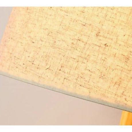 Gros plan de la texture tissu de l'abat-jour beige, fibres et trame visibles