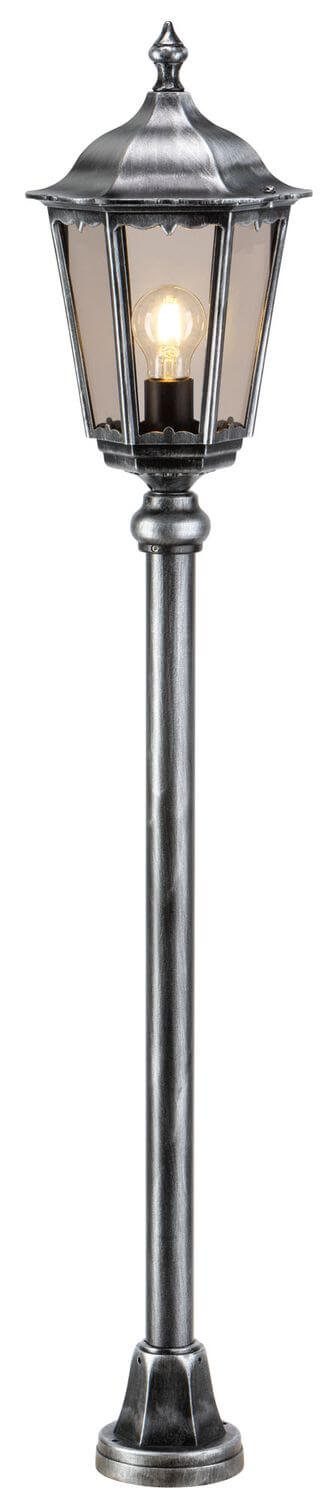 Détail du luminaire de borne, lanterne à facettes et pied cylindrique argenté