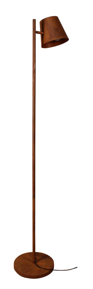 Vue de face du lampadaire rouille avec long pied vertical et abat-jour conique incliné.