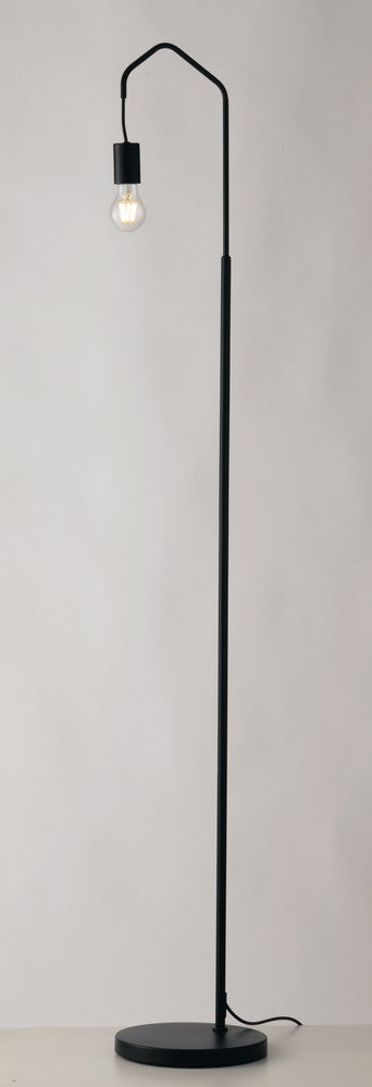 Lampadaire installé dans un intérieur clair, câble apparent au sol
