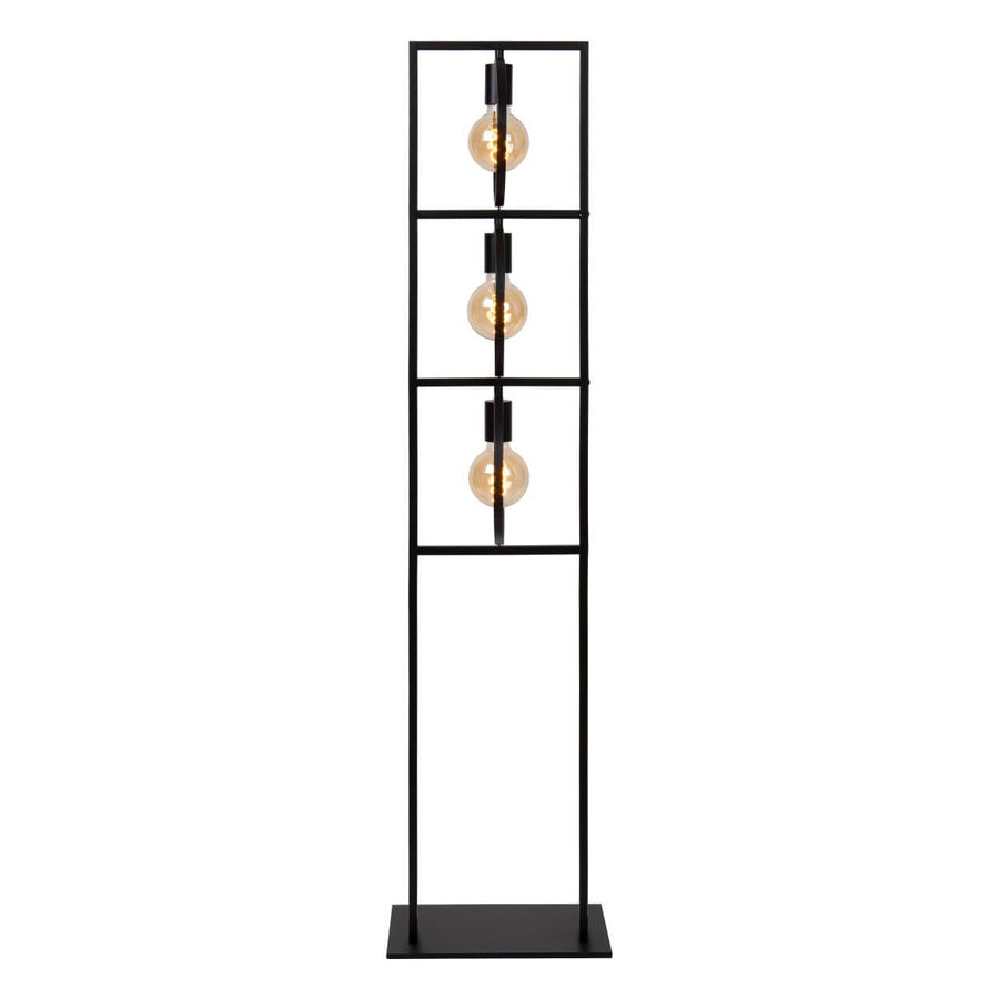 Profil latéral du lampadaire noir, monture fine et ampoules alignées verticalement
