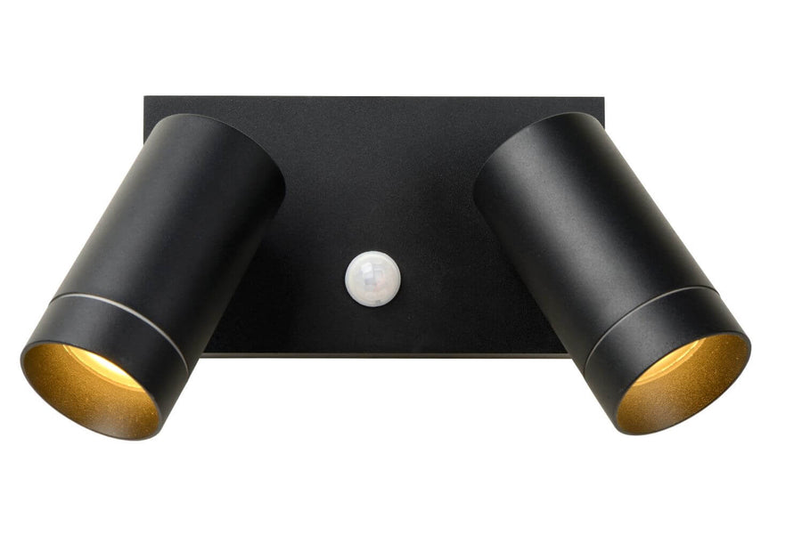 Vue de face sur fond blanc, applique noire deux cylindres et intérieur doré non allumé.