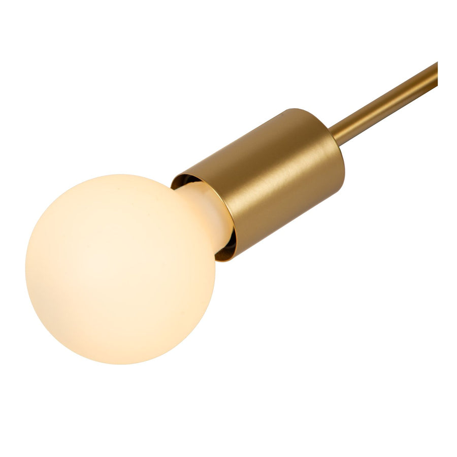 Gros plan sur une douille cylindrique dorée et son globe de verre opalin.