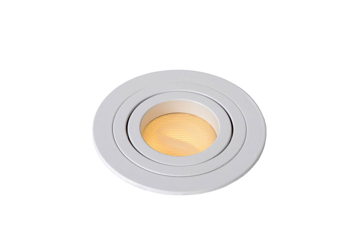 Détail de la collerette blanche et de la lentille striée dorée du spot
