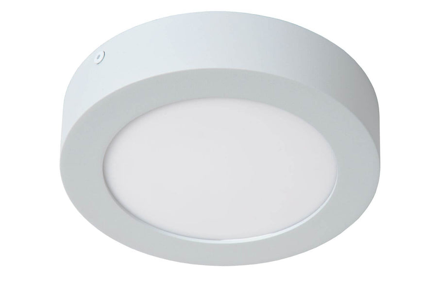 Détail de la collerette blanche et vis de fixation sur le côté du luminaire.