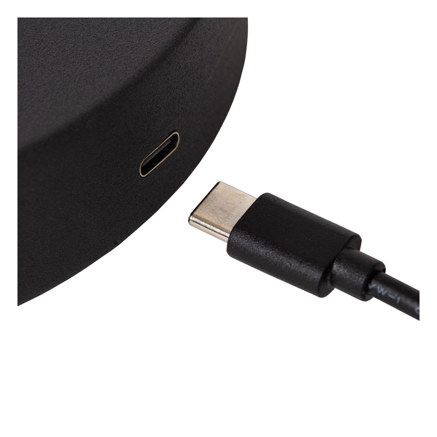 Détail de la base noire avec port USB-C et connecteur de recharge.