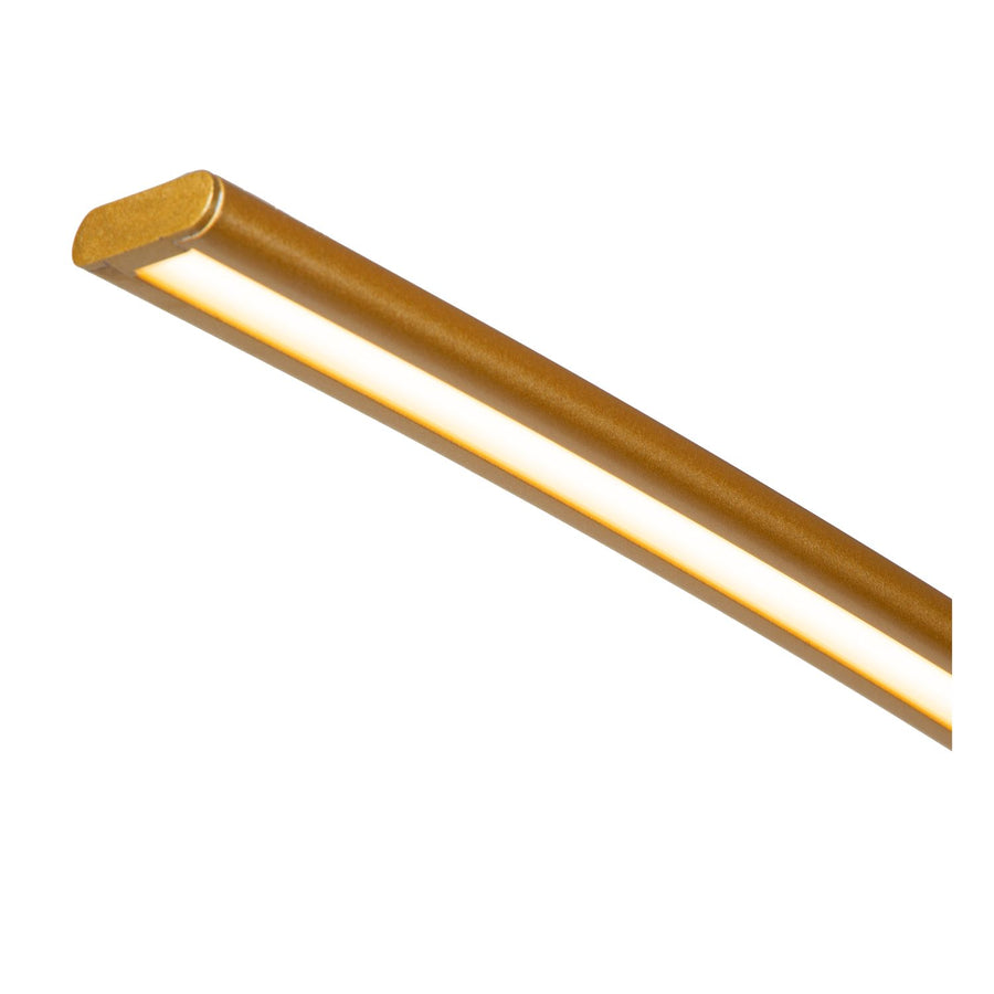 Détail de la tête lumineuse LED linéaire dorée et de son embout arrondi.