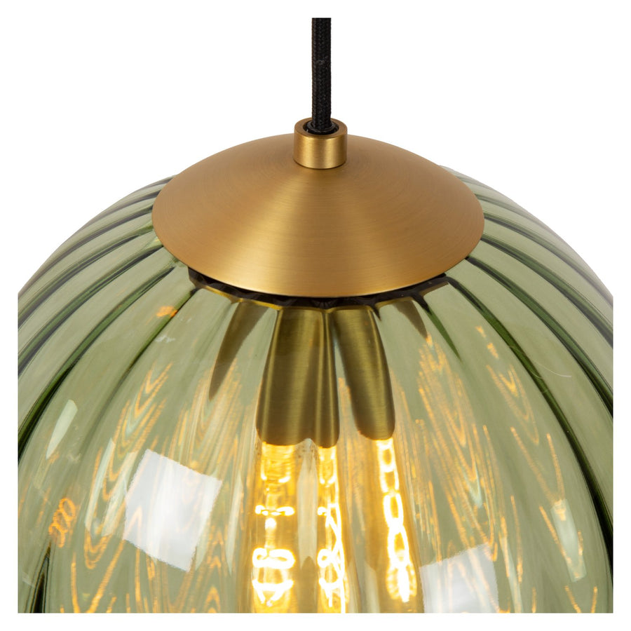 Détail du sommet : cabochon doré brossé et verre vert à côtes