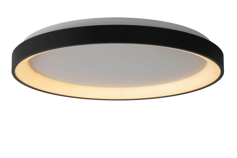 Vue rapprochée du cerclage noir et du diffuseur opale diffusant une lumière chaude
