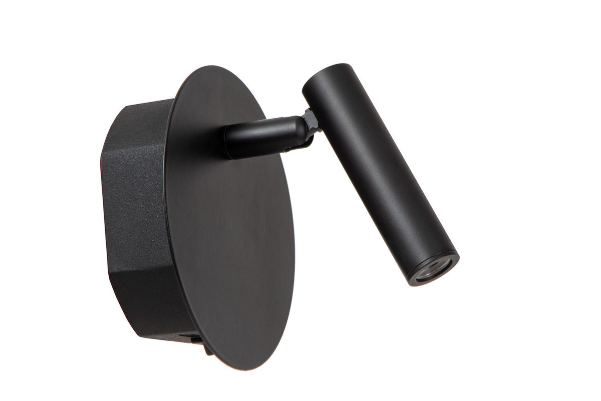 Face avant du luminaire noir, projecteur cylindrique incliné vers le bas