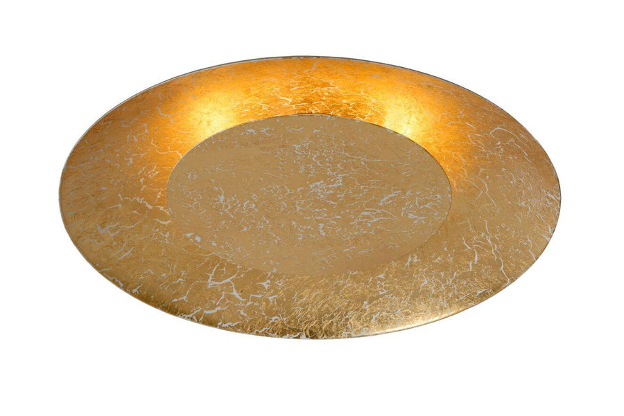 Vue rapprochée du diffuseur doré à la feuille, motif marbré et centre lisse.