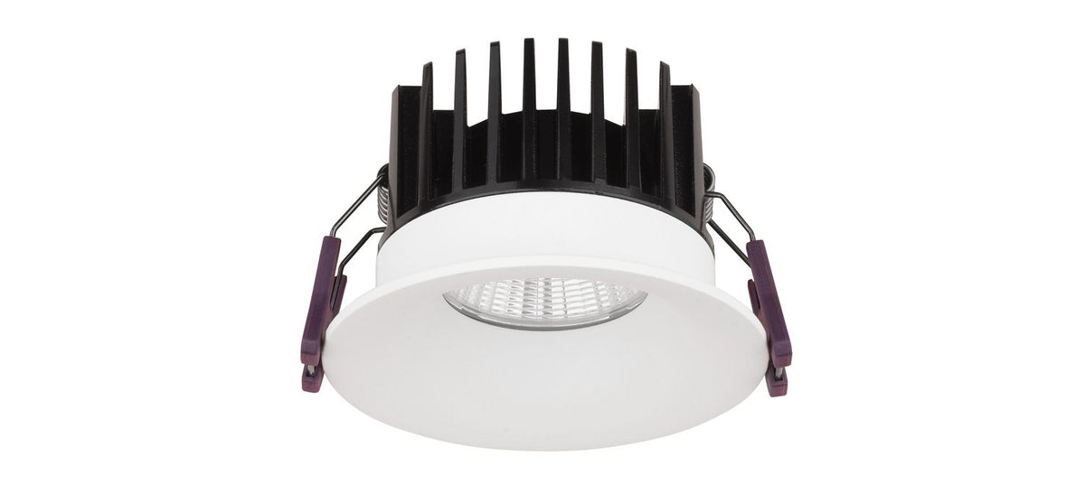 Face avant du projecteur rond blanc, lentille striée et ressorts de fixation latéraux