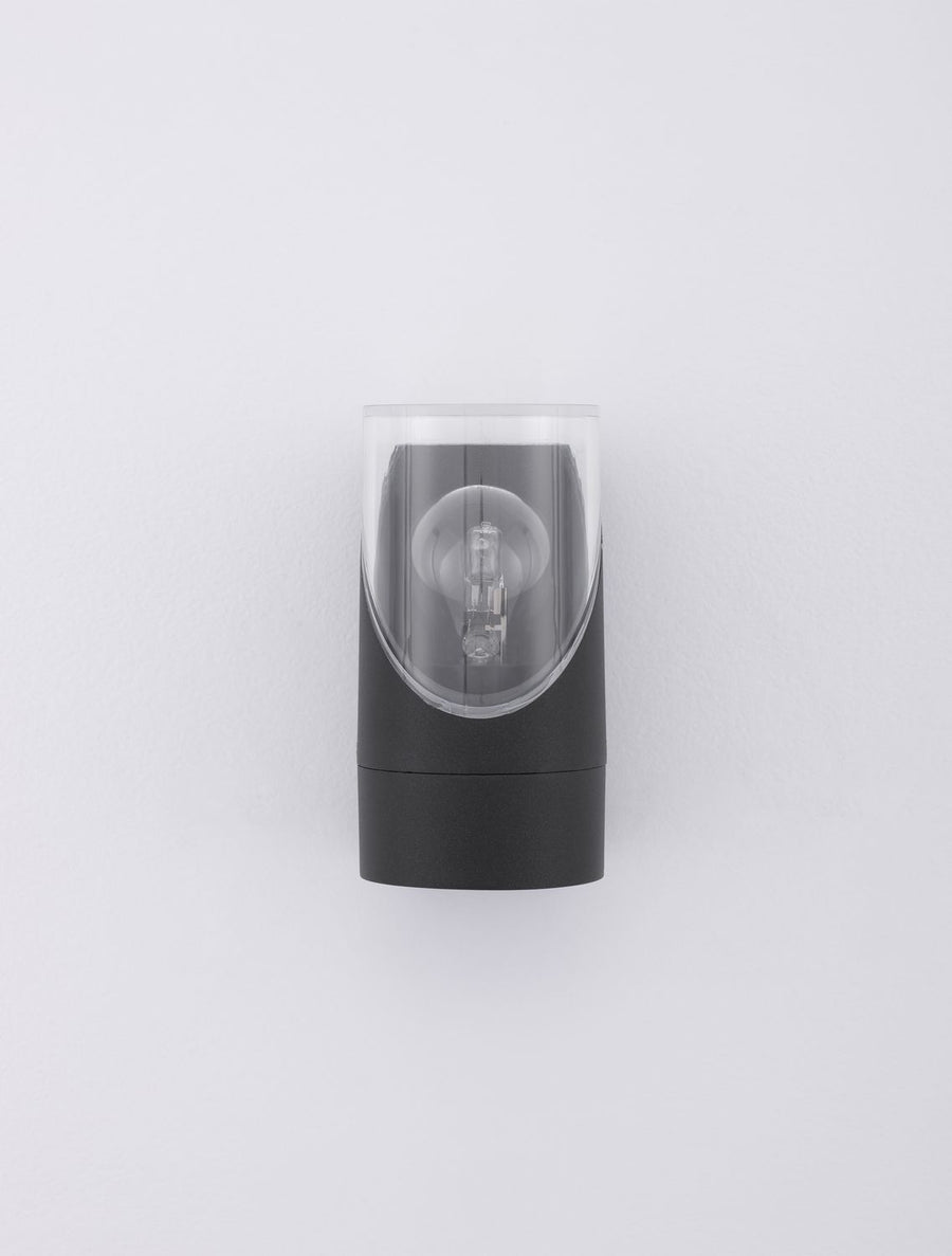 Face légèrement décalée montrant la coque noire et le verre transparent