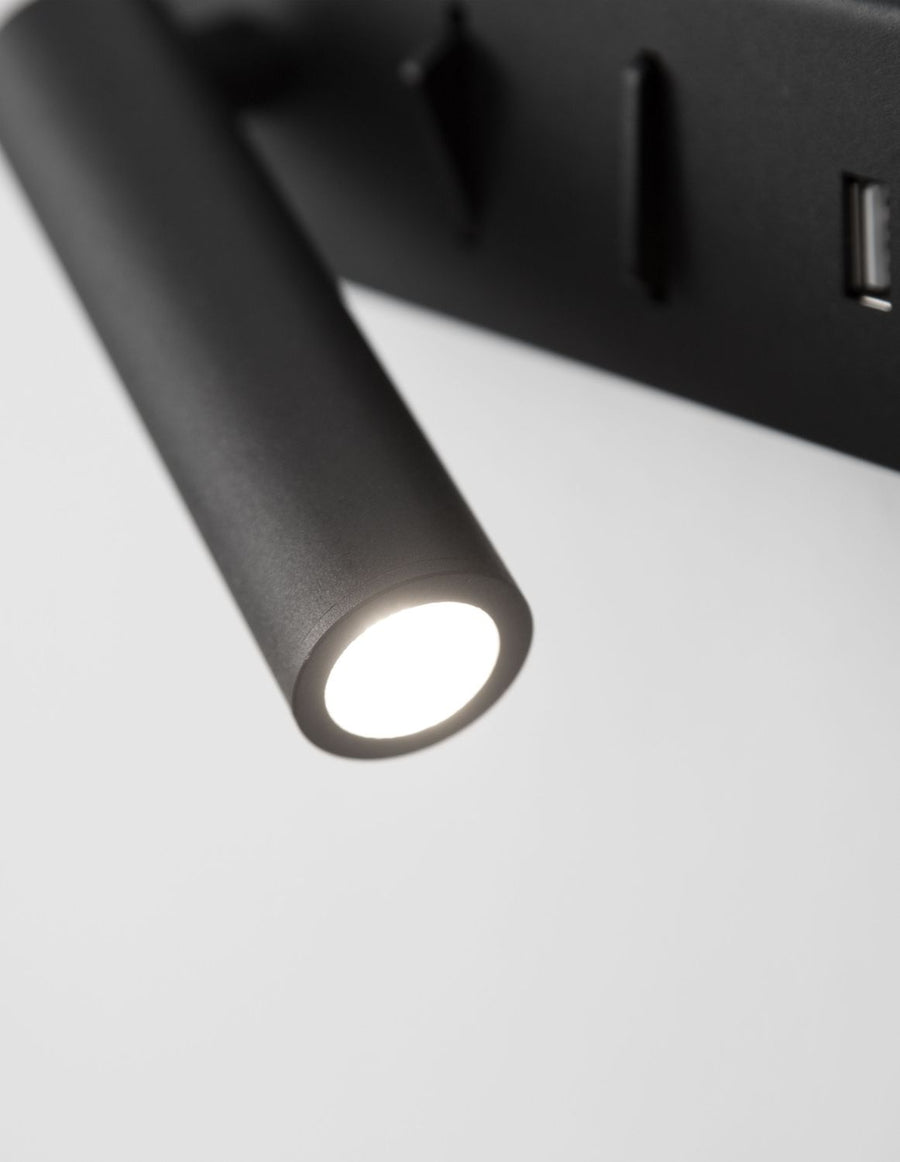 Gros plan sur la lentille LED du bras cylindrique en fonctionnement.