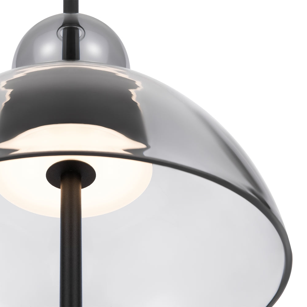 Gros plan sur le verre fumé et la lumière chaude du diffuseur opale