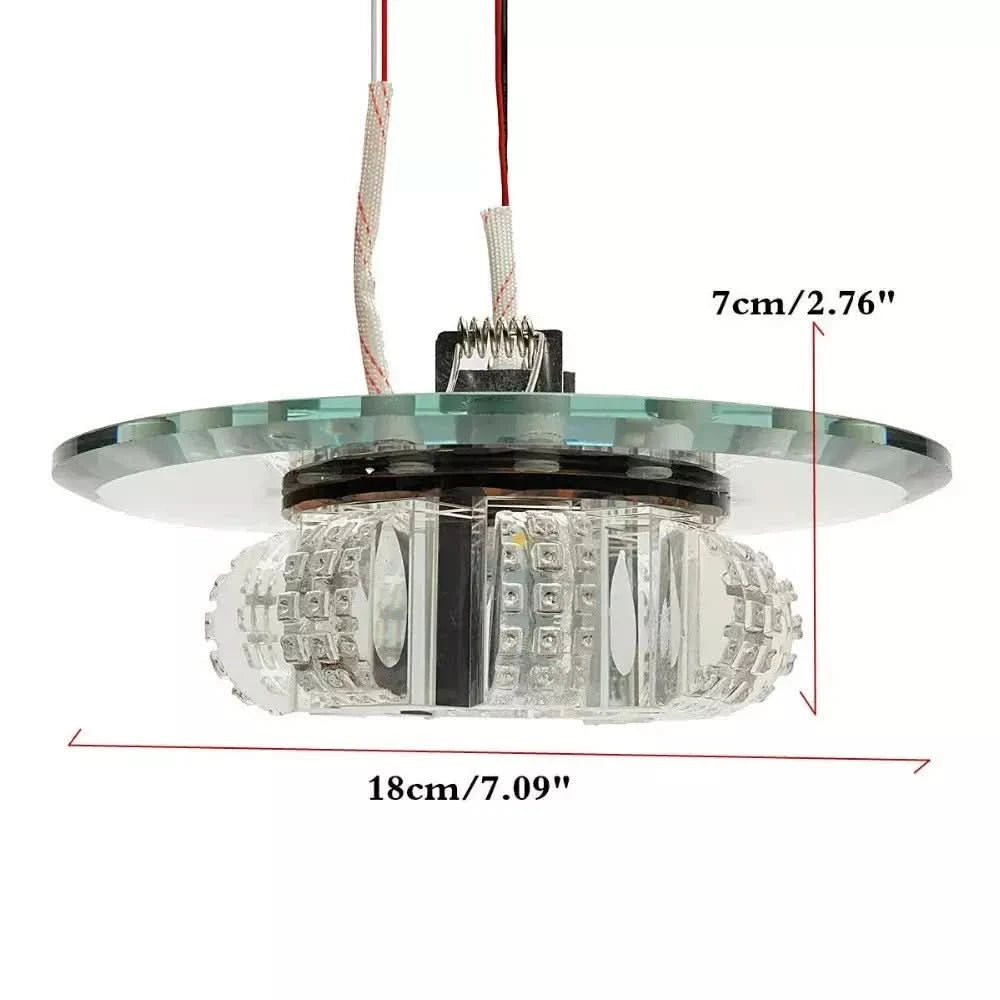 Vue de profil cotée du luminaire, diamètre 18 cm et hauteur 7 cm, fils électriques.