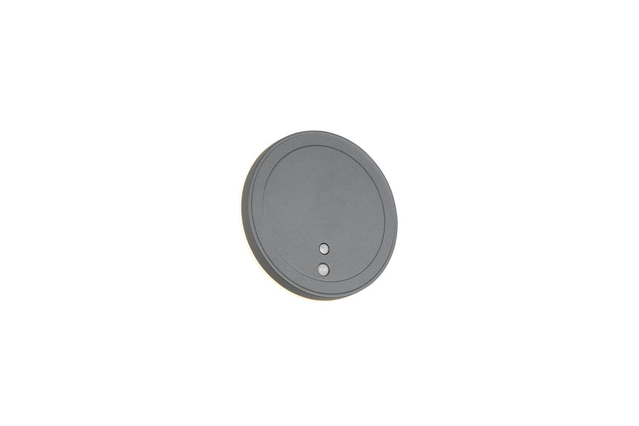 Autre vue de face du disque mural anthracite avec ses deux points lumineux