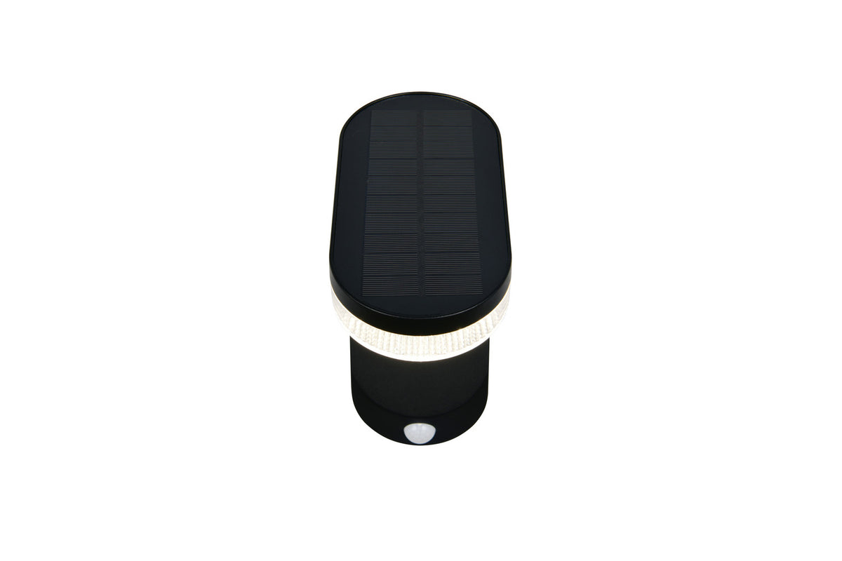Vue de dessus montrant le panneau solaire noir et la bague lumineuse périphérique.
