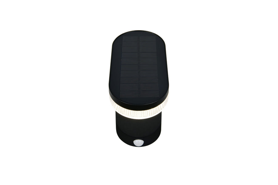 Vue de dessus montrant le panneau solaire noir et la bague lumineuse périphérique.