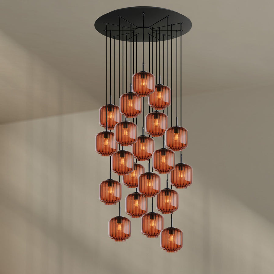 Produit de face sur fond neutre, suspension complète aux verres ambrés et câbles noirs.