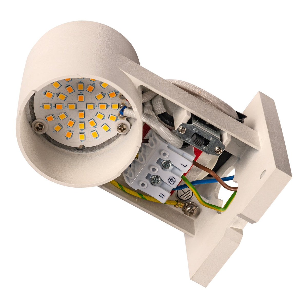 Détail interne du module LED et du bornier de raccordement électrique blanc.